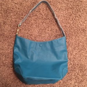 NWOT Teal Avon tote purse plastic still on strap